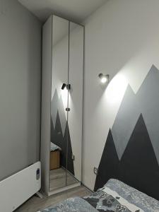 Llit o llits en una habitació de Apartment Triangle