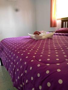 Ein Bett oder Betten in einem Zimmer der Unterkunft Chalisa Bukit House Lanta