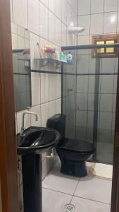 Phòng tắm tại Casa Aconchego