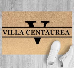 タオルミーナにあるVilla Centaurea Apartment with private parkingの百年記念の家紋