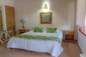 Ένα ή περισσότερα κρεβάτια σε δωμάτιο στο Hotel Barranqueros Soledén