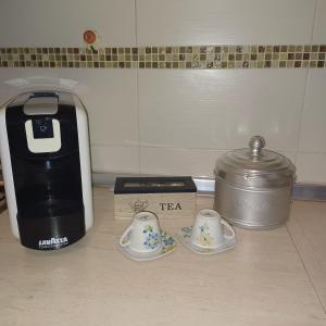 Coffee and tea making facilities at NSM Casa di Fulmine attico con box privato
