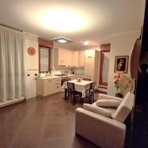 A kitchen or kitchenette at NSM Casa di Fulmine attico con box privato