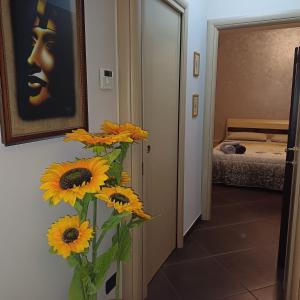 A bed or beds in a room at NSM Casa di Fulmine attico con box privato