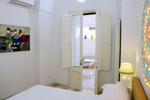 A bed or beds in a room at Li Frati Casa Vacanze