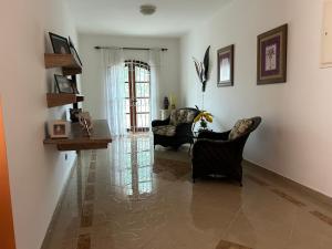 Posezení v ubytování Quarto com / Bosque / Estoril / SJC