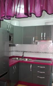 Kuchyňa alebo kuchynka v ubytovaní Apartamento Sirena + 6 fotografií