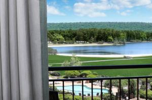 a view of a lake from a balcony at Callaway Resort & Gardens in Pine Mountain
