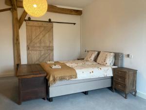 Postel nebo postele na pokoji v ubytování Hoeve de Snippert