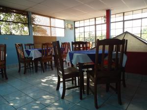 Reštaurácia alebo iné gastronomické zariadenie v ubytovaní CENTRO YAYABO