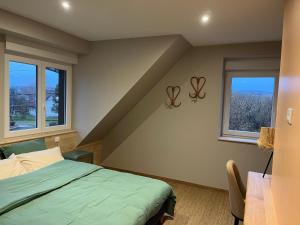 Postel nebo postele na pokoji v ubytování Maison d hôtes SPA Pivoine et Colibri