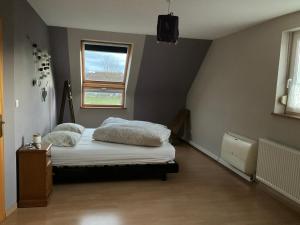 Postel nebo postele na pokoji v ubytování Entre vignes et châteaux. + 23 fotografií