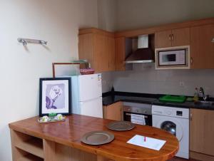 מטבח או מטבחון ב-Apartamentos Las Cuadras de Estaños