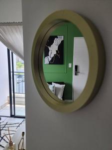 a mirror on a wall in a room at 297 The Blyde Crystal Lagoon in Pretoria