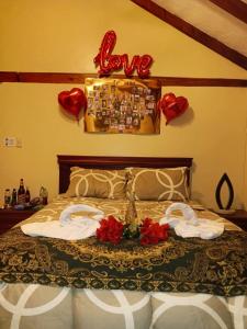 Ένα ή περισσότερα κρεβάτια σε δωμάτιο στο HOTELERIA CASA MAYA