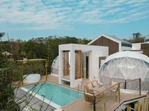 a house with a swimming pool and a igloo at The X10 Nordic Tent and Glamping Pool Villa Khaoyai เขาใหญ่ - SHA Certified in Ban Thung Sawang