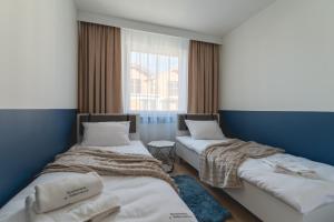 Легло или легла в стая в Apartament Royal Blue - Sauna IR, widok na Karkonosze, parking podziemny