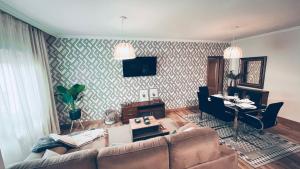 a living room with a couch and a table at Ponte Dena in Pontevedra