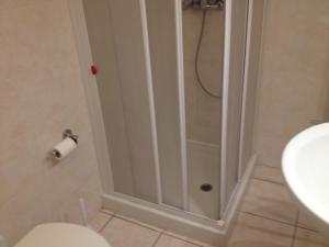 Koupelna v ubytování Hotel Belforte