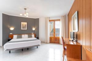 Łóżko lub łóżka w pokoju w obiekcie Hotel Alda Ciudad de Toro