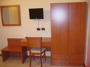 TV a/nebo společenská místnost v ubytování Hotel Belforte