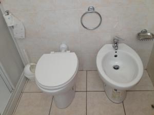 Koupelna v ubytování Hotel Belforte