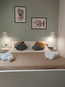 A bed or beds in a room at 111 ColaDiRienzo Rooms - by AD Roma
