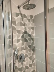 A bathroom at 111 ColaDiRienzo Rooms - by AD Roma