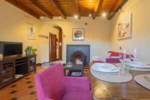 TV/trung tâm giải trí tại Casa Giovio Elengant loft in historical building