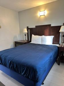 Postel nebo postele na pokoji v ubytování Travelodge by Wyndham Langley