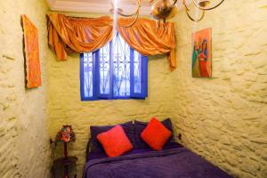 Letto o letti in una camera di Dar Lalhambra