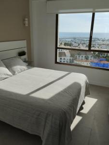 Postel nebo postele na pokoji v ubytování Apartamento privado en Hotel Sol Aloha