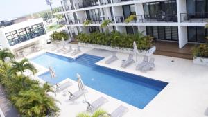 Tầm nhìn ra hồ bơi gần/tại Cancun Amazing Penthouse with Pool, Gym and Fast Wifi