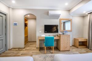 TV a/nebo společenská místnost v ubytování Mamlouk Pyramids Hotel
