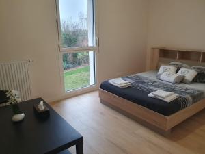 Gallery image of Appartement à Floirac avec 2 chambres, un parking privé, une terrasse, à 5 minutes en voiture de l'Arkéa Arena de Bordeaux in Floirac +11 photos
