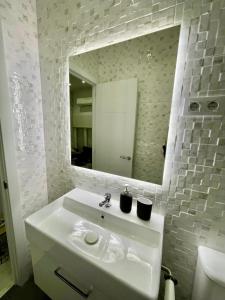 Ванная комната в Adorable apartamento en Chamberi