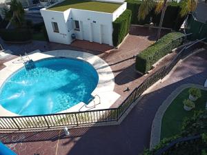 Bazén v ubytovaní 2 Paradise of Benalmádena Residencial Los Patos II a 300 metros de la playa y supermercados, wifi gratis, vistas a la montaña alebo v jeho blízkosti
