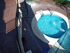 Bazén v ubytovaní 2 Paradise of Benalmádena Residencial Los Patos II a 300 metros de la playa y supermercados, wifi gratis, vistas a la montaña alebo v jeho blízkosti