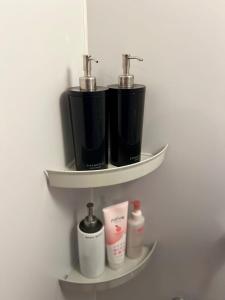 a shelf with two faucets and toiletries on it at JOOOOY building 2Kai - Vacation STAY 60626v in Amami