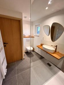Ein Badezimmer in der Unterkunft Gîte urbain L'Oneux