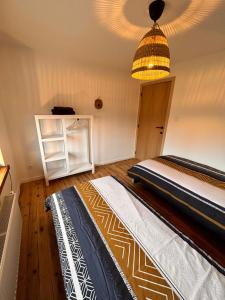 Ein Bett oder Betten in einem Zimmer der Unterkunft Gîte urbain L'Oneux