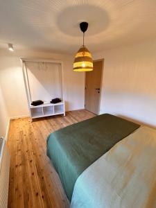 Ein Bett oder Betten in einem Zimmer der Unterkunft Gîte urbain L'Oneux