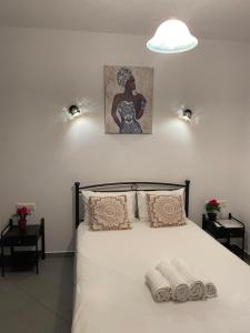 Ένα ή περισσότερα κρεβάτια σε δωμάτιο στο Studios Thiseas 2