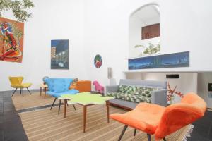 Χώρος καθιστικού στο Les Jardins de Rio Boutique Hotel
