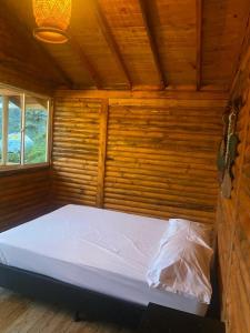 Postel nebo postele na pokoji v ubytování El mirador de San Joaquin