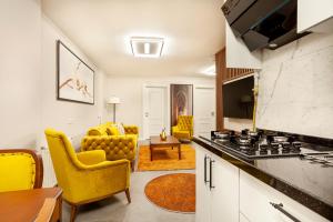 Μια τηλεόραση ή/και κέντρο ψυχαγωγίας στο Bellavia Deluxe Apart
