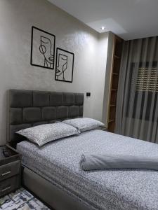 Un pat sau paturi într-o cameră la Home sweet home