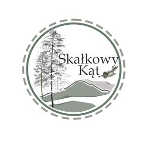 a round emblem with a winter landscape with trees and snow at Skałkowy Kąt in Sromowce Wyżne