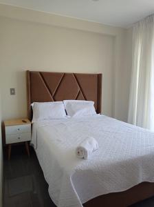 Postel nebo postele na pokoji v ubytování Hotel Sunlight