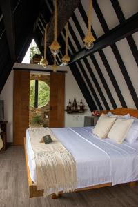 Ένα ή περισσότερα κρεβάτια σε δωμάτιο στο Ecoluxury Glamping